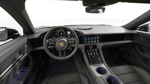 Interior view showing the steering wheel and dashboard of Taycan 4S Black Edition