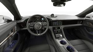 Interior view showing the steering wheel and dashboard of Taycan Turbo Cross Turismo