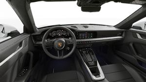 Vedere din interior care prezintă volanul și panoul de bord al 911 Carrera Cabriolet