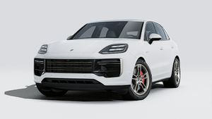 Vedere exterioară a Cayenne Turbo E-Hybrid care prezintă partea din față și partea stângă a mașinii