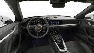 Interior view showing the steering wheel and dashboard of 911 Carrera Cabriolet