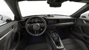 Interior view showing the steering wheel and dashboard of 911 Turbo S Cabriolet