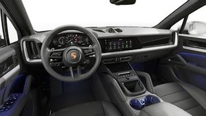 Interior view showing the steering wheel and dashboard of Cayenne E-Hybrid