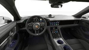 Interior view showing the steering wheel and dashboard of Taycan GTS
