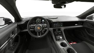 Interior view showing the steering wheel and dashboard of Taycan Turbo GT with Weissach Package