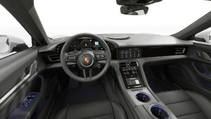 Interior view showing the steering wheel and dashboard of Taycan 4 Cross Turismo