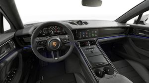 Interior view showing the steering wheel and dashboard of Panamera GTS