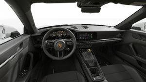 Interiörvy som visar ratten och instrumentbrädan på 911 GT3 Touring