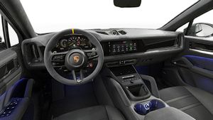 Interiörvy som visar ratten och instrumentbrädan på Cayenne Turbo E-Hybrid Coupé with GT Package