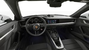 Interior view showing the steering wheel and dashboard of 911 Carrera Cabriolet
