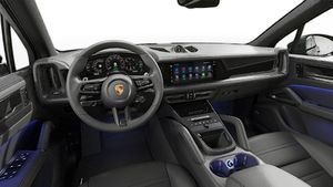 Interior view showing the steering wheel and dashboard of Cayenne E-Hybrid Black Edition