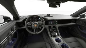 Interior view showing the steering wheel and dashboard of Taycan 4S Black Edition