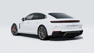 Exterior view of Panamera Turbo E-Hybrid showing the back and left side of the car