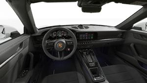 Interior view showing the steering wheel and dashboard of 911 Carrera GTS Cabriolet