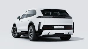 Exterior view of Cayenne Turbo Electric showing the back and left side of the car
