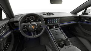Interior view showing the steering wheel and dashboard of Panamera GTS