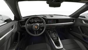Vue de l'intérieur montrant le volant et le tableau de bord d'un véhicule de transport de marchandises. 911 Targa 4S