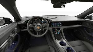 Vue de l'intérieur montrant le volant et le tableau de bord d'un véhicule de transport de marchandises. Taycan 4S Black Edition