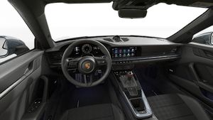 Interior view showing the steering wheel and dashboard of 911 Carrera T