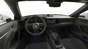 Interior view showing the steering wheel and dashboard of 911 Targa 4 GTS