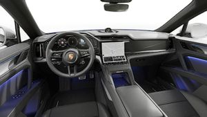 Interior view showing the steering wheel and dashboard of Cayenne S Coupé Electric