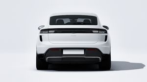 Exterior view of Macan Turbo Electric showing the rear of the car
