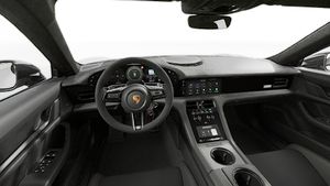 Interior view showing the steering wheel and dashboard of Taycan Turbo GT with Weissach Package