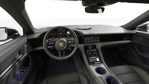 Interior view showing the steering wheel and dashboard of Taycan Black Edition