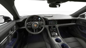 Interior view showing the steering wheel and dashboard of Taycan 4S Black Edition