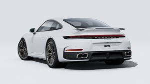 Зовнішній вигляд 911 Turbo S , що показує задню і ліву сторону автомобіля
