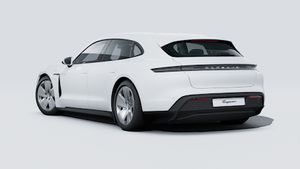 Зовнішній вигляд Taycan Sport Turismo , що показує задню і ліву сторону автомобіля