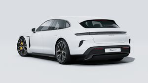 Зовнішній вигляд Taycan Turbo S Sport Turismo , що показує задню і ліву сторону автомобіля