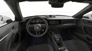 Interior view showing the steering wheel and dashboard of 911 Carrera GTS Cabriolet