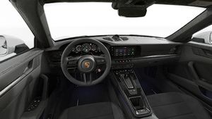Interior view showing the steering wheel and dashboard of 911 Targa 4 GTS