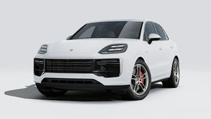 Exterior view of Cayenne Turbo E-Hybrid showing the front and left side of the car