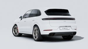 Exterior view of Cayenne Turbo E-Hybrid showing the back and left side of the car