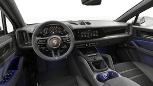 Interior view showing the steering wheel and dashboard of Cayenne GTS Coupé