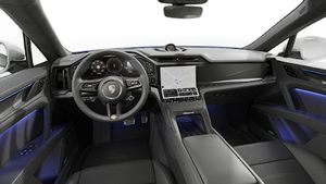 Interior view showing the steering wheel and dashboard of Cayenne Turbo Coupe Electric