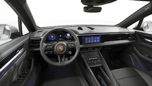 Interior view showing the steering wheel and dashboard of Macan 4S
