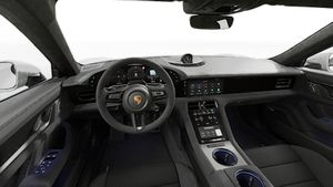 Interior view showing the steering wheel and dashboard of Taycan GTS