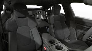 Interior view showing the front seats of Taycan Turbo GT with Weissach Package
