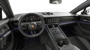 Interior view showing the steering wheel and dashboard of Panamera GTS