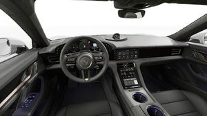 Vista interior que muestra el volante y el salpicadero de Taycan Turbo S