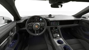 Interior view showing the steering wheel and dashboard of Taycan GTS