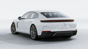Exterior view of Panamera Turbo E-Hybrid showing the back and left side of the car