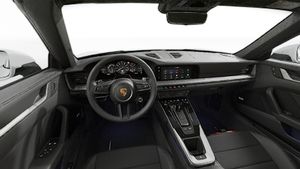 Interior view showing the steering wheel and dashboard of 911 Targa 4S
