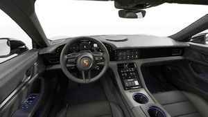 Interior view showing the steering wheel and dashboard of Taycan 4S Black Edition
