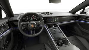 Interior view showing the steering wheel and dashboard of Panamera 4S E-Hybrid