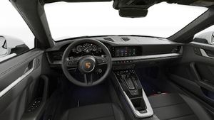 Interior view showing the steering wheel and dashboard of 911 Carrera Cabriolet