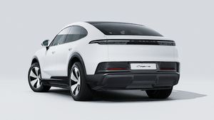 Exterior view of Cayenne Coupé Electric showing the back and left side of the car